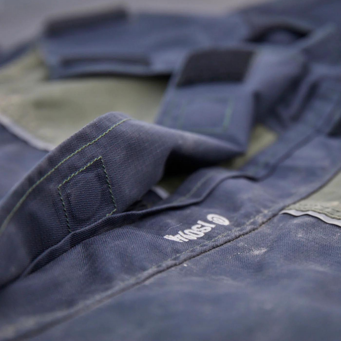 Magnetic Dome Closures on Waterproof Betacraft Workwear.