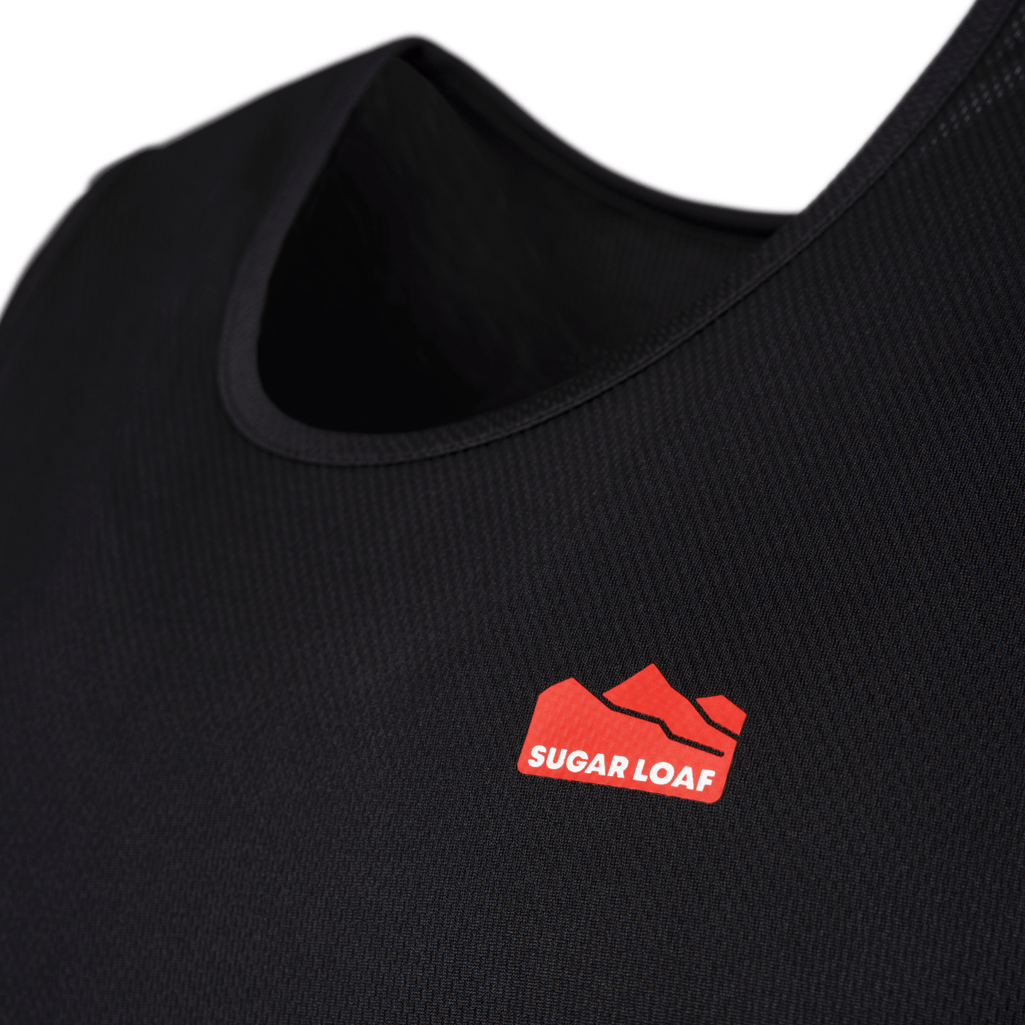 Close up of Sugar Loaf branded shearing clothing – black singlet vest for farm work.