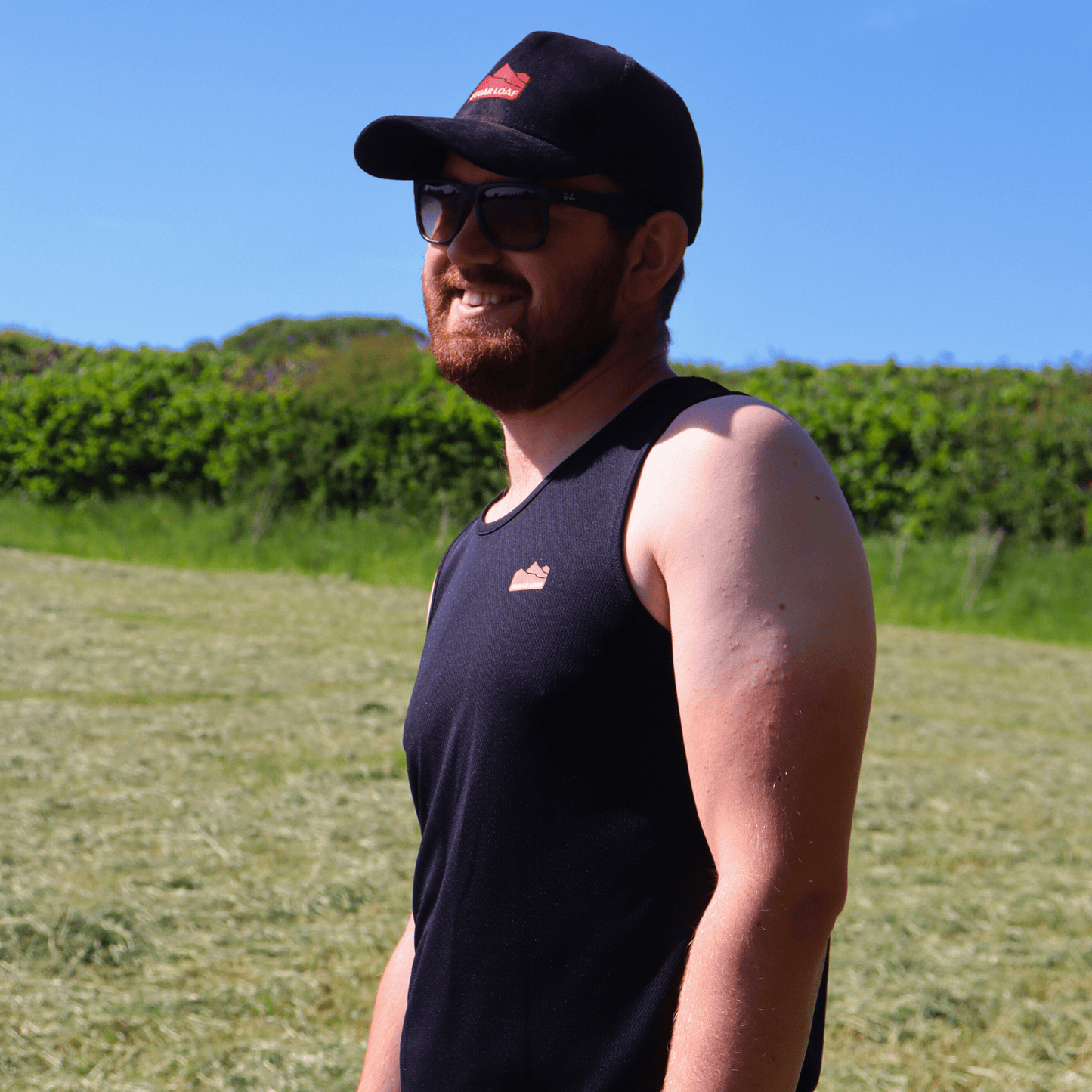 Sugar Loaf Performance Shearing Singlet, worn as a part of Sugar Loaf's summer farm wear collection.