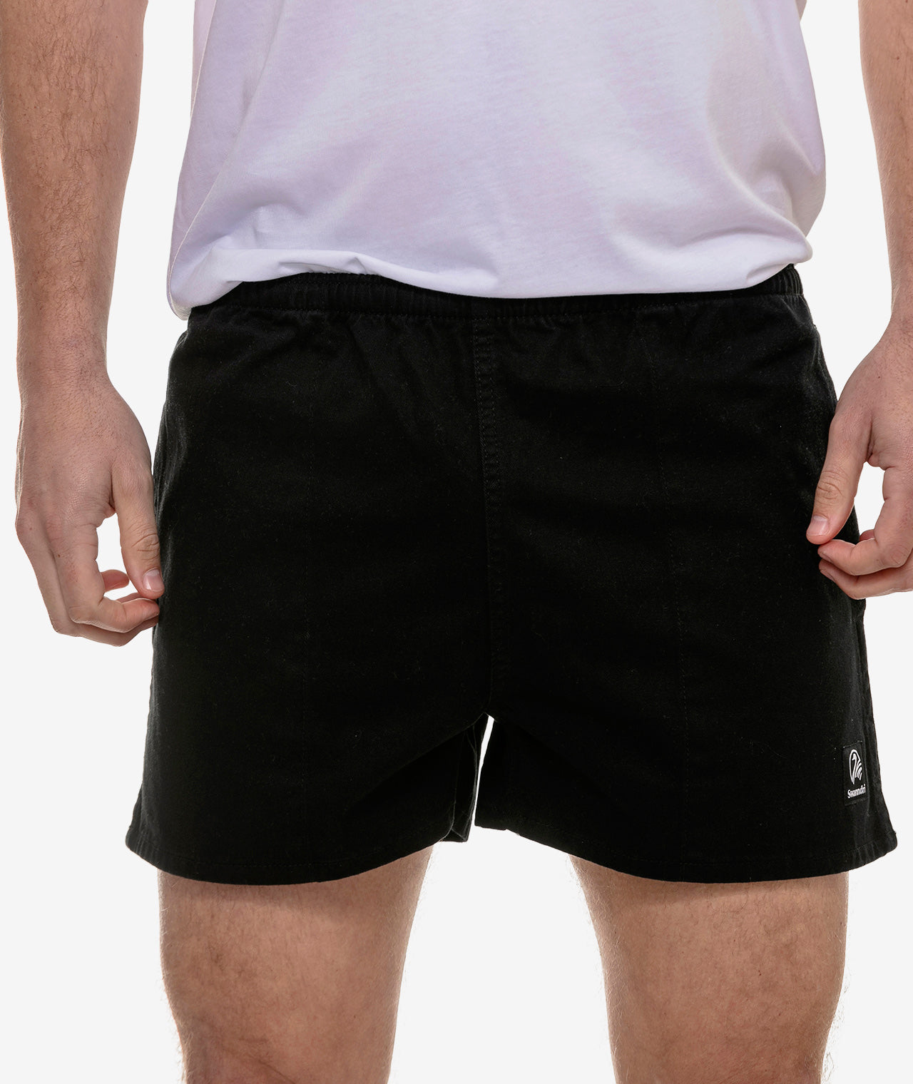 mens rugby shorts with pockets worn on someone's legs
