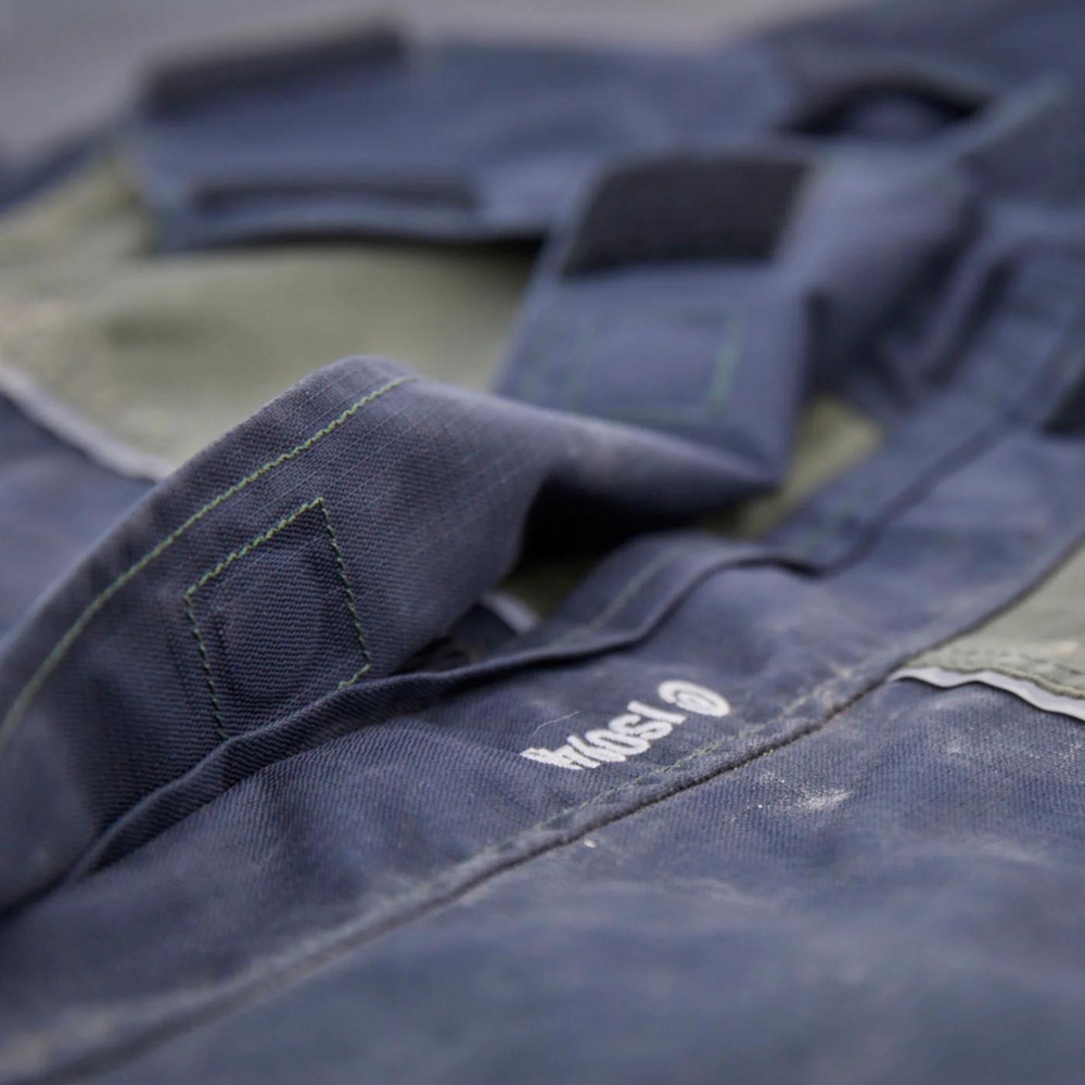 
                  
                    Magnetic Dome Closures on Waterproof Betacraft Workwear.
                  
                