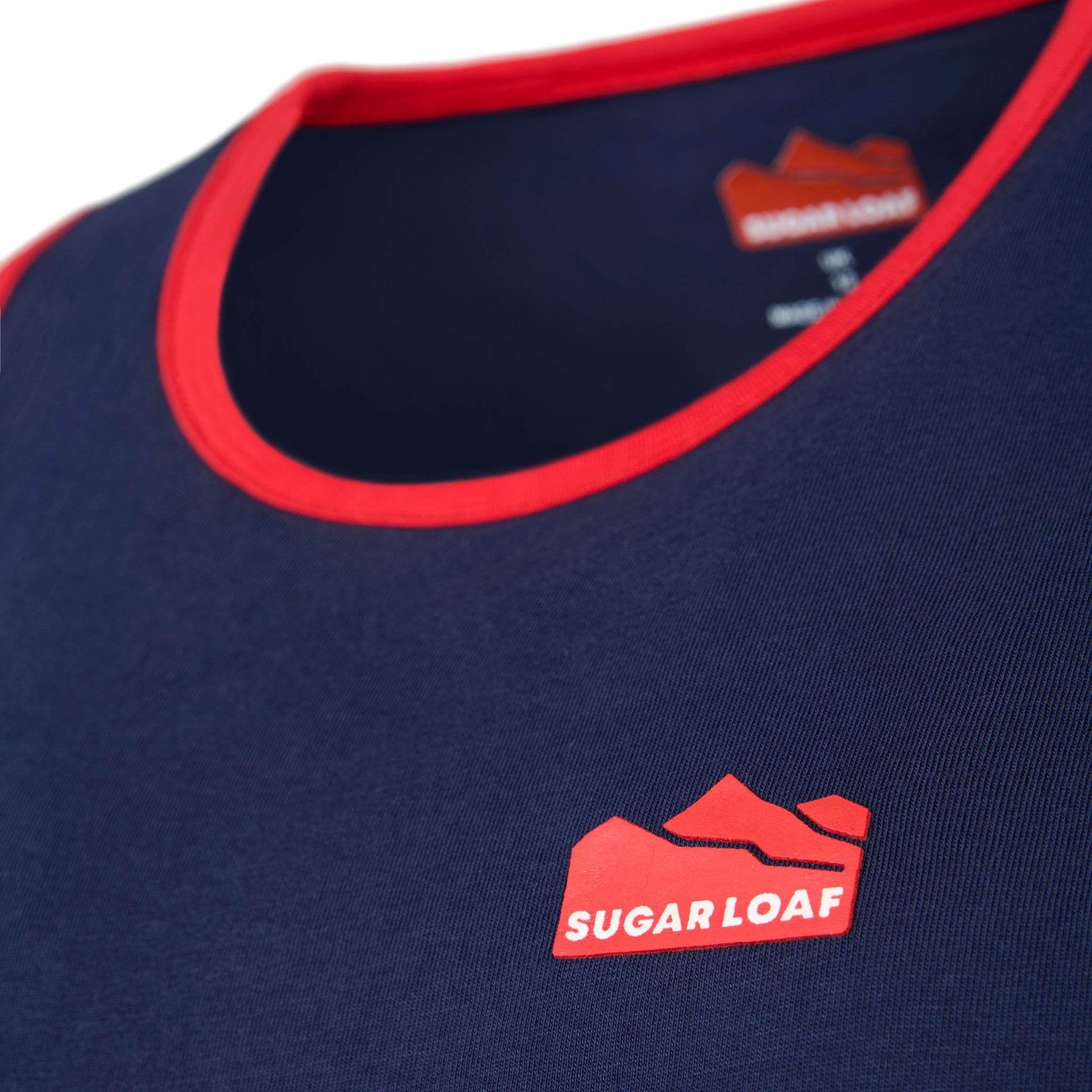 
                    
                      Sugar Loaf logo and neckline detail on Navy and Red Kids cotton Singlet for farming.
                    
                  