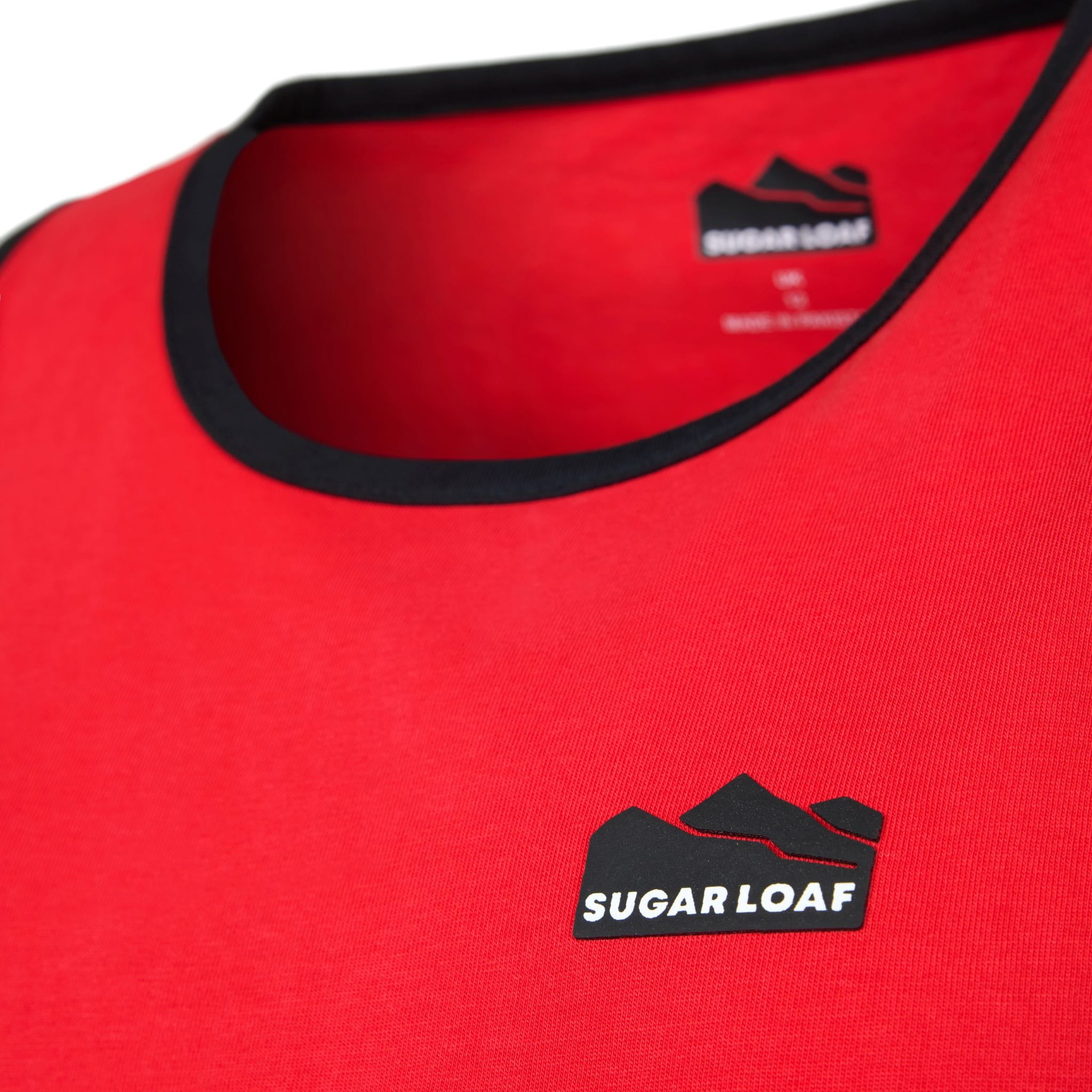 
                    
                      Sugar Loaf logo and neckline detail on Red and Black kids farming vest.
                    
                  