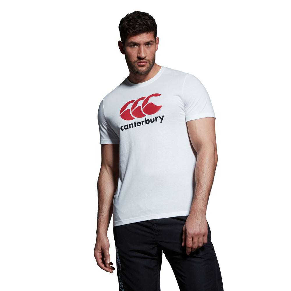 
                  
                    Male wearing white Canterbury tshirts with red and black logo on front
                  
                