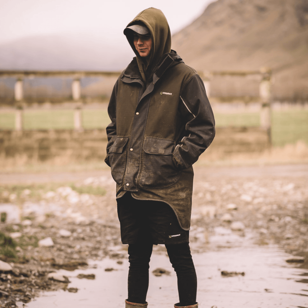 
                  
                    Kaiwaka coat in use on the farm, part of Kaiwaka's Stormforce range of farm wear for men.
                  
                