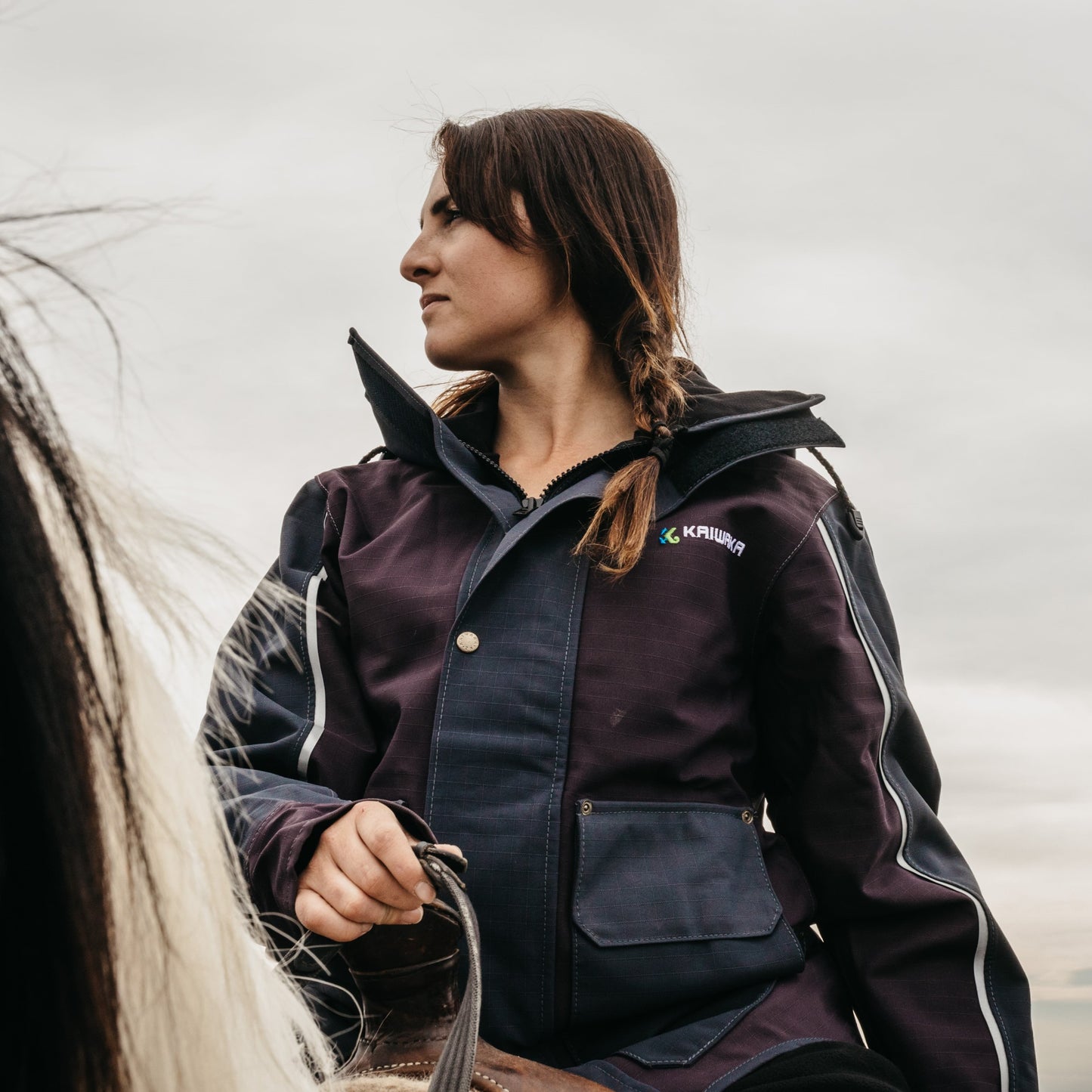 Female farmer in Kaiwaka Women’s Stormforce Winter Jacket, trusted Kaiwaka coat for agricultural workwear.