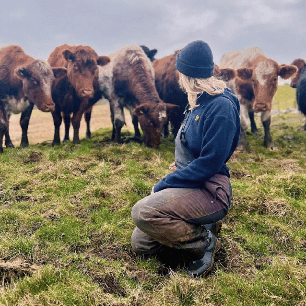 
                  
                    Lifestyle shot of women’s bib and brace overalls from Kaiwaka clothing, 100% waterproof ladies farm clothing.
                  
                