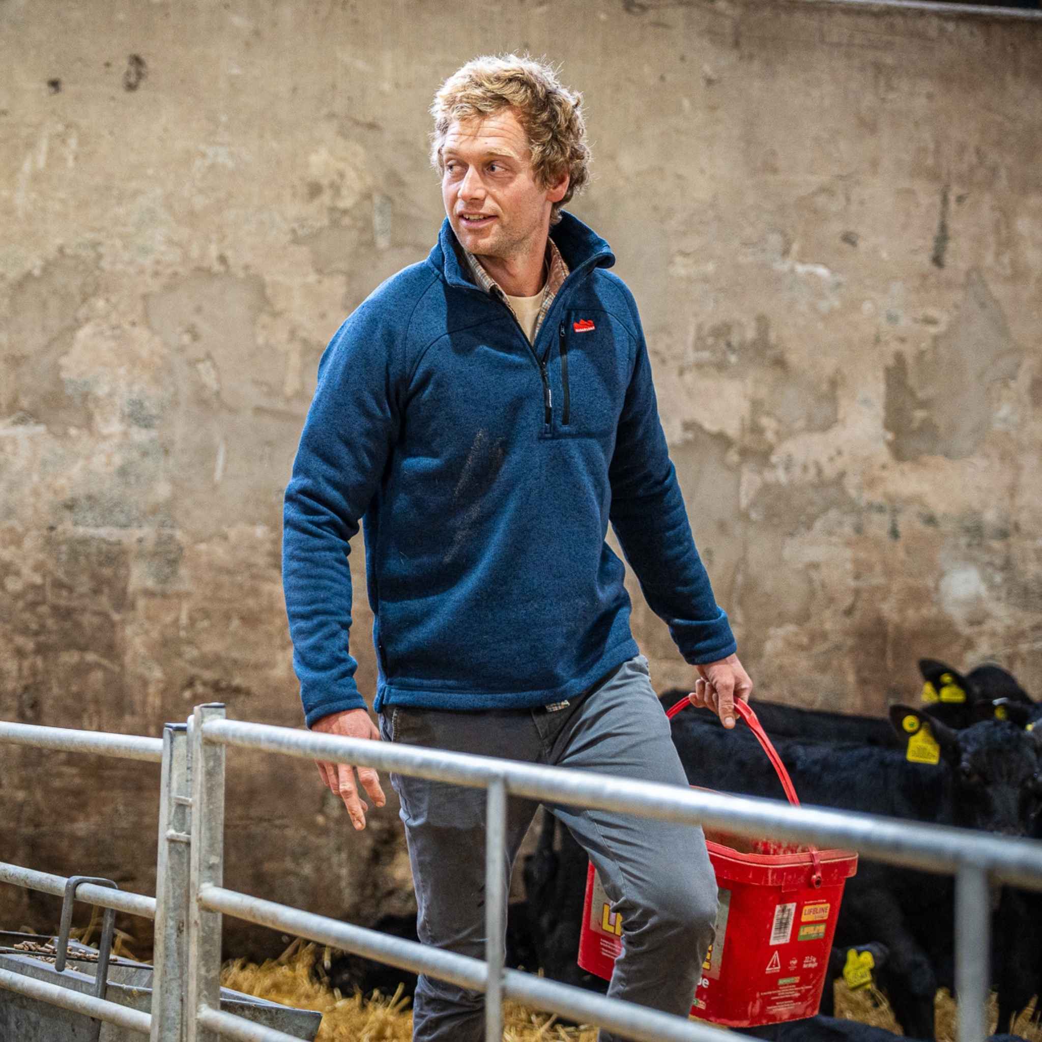 
                    
                      Lifestyle shot of Sugar Loaf Fell Half Zip Fleece navy, classic men's country fleece for long days on the land.
                    
                  