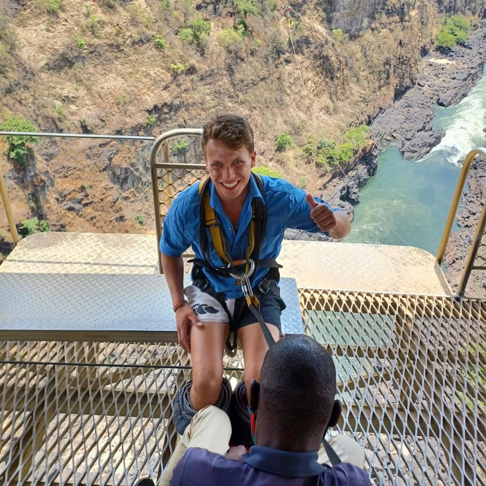 
                  
                    Bungee jumper wearing white and navy Canterbury shorts and about to jump
                  
                