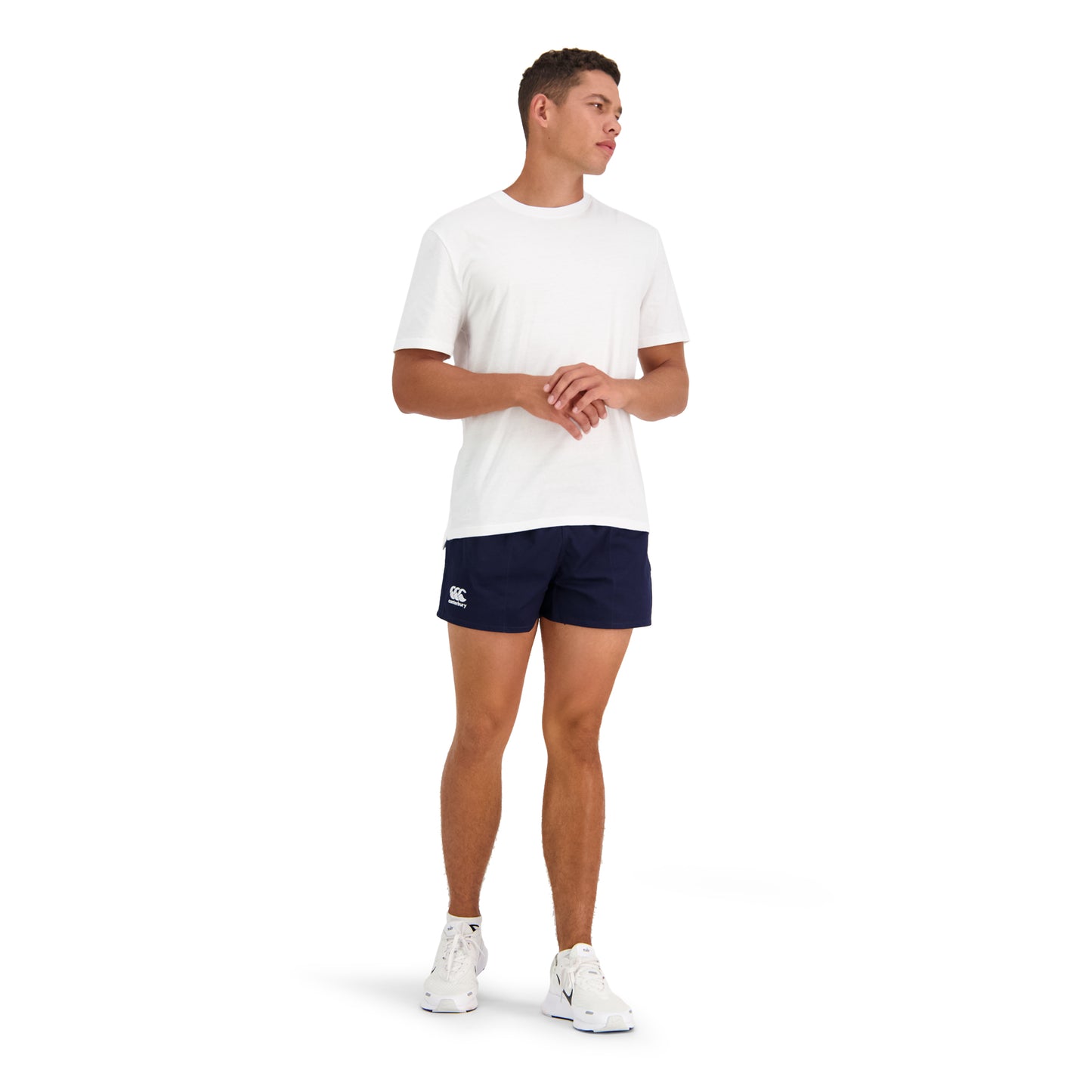 
                  
                    Model wearing Canterbury navy rugby shorts and white shirt
                  
                