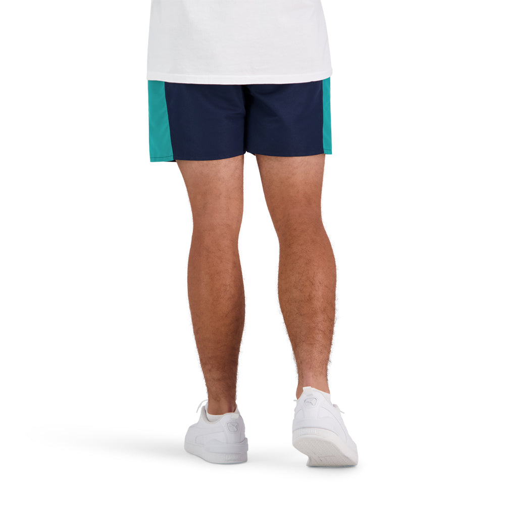 
                  
                    Navy and teal Canterbury rugby clothing
                  
                