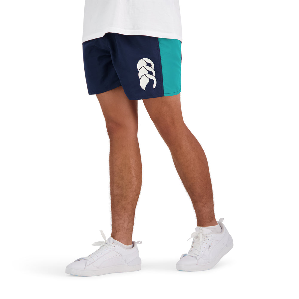 
                  
                    Navy Canterbury shorts with the Canterbury clothing logo visible 
                  
                