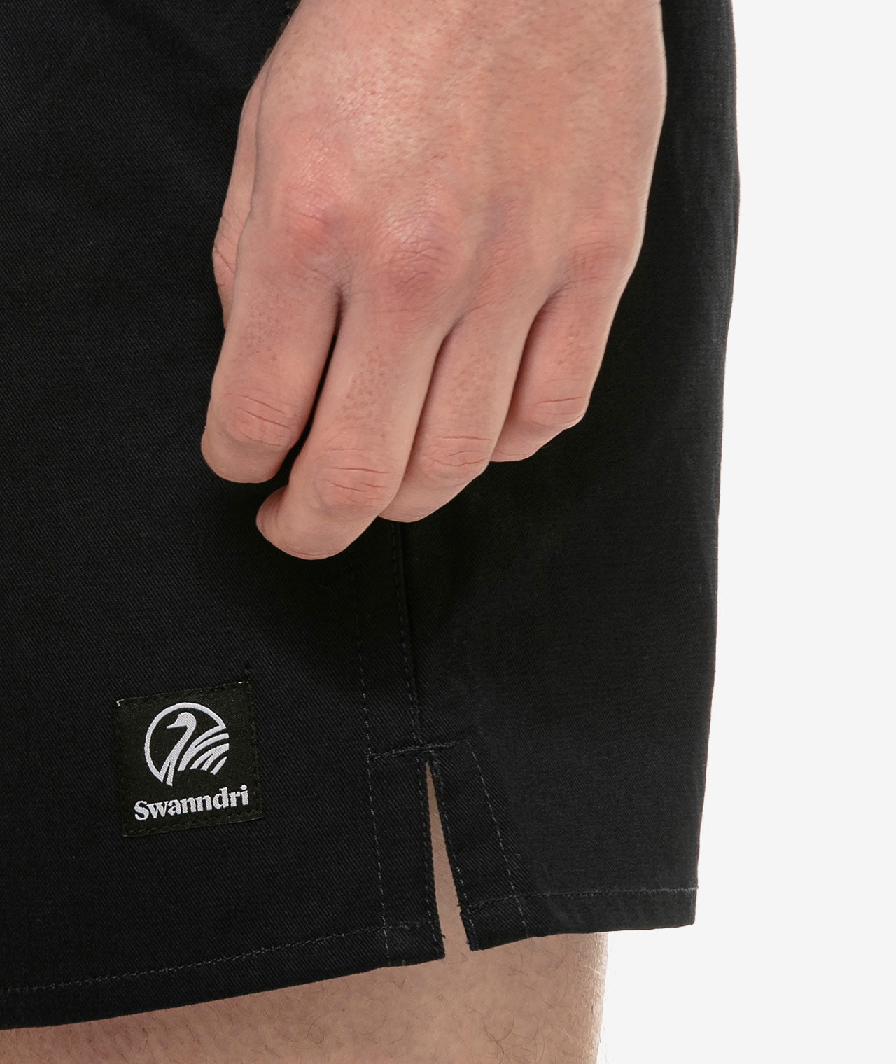 
                  
                    Closeup of swanndri clothes logo on the shorts
                  
                